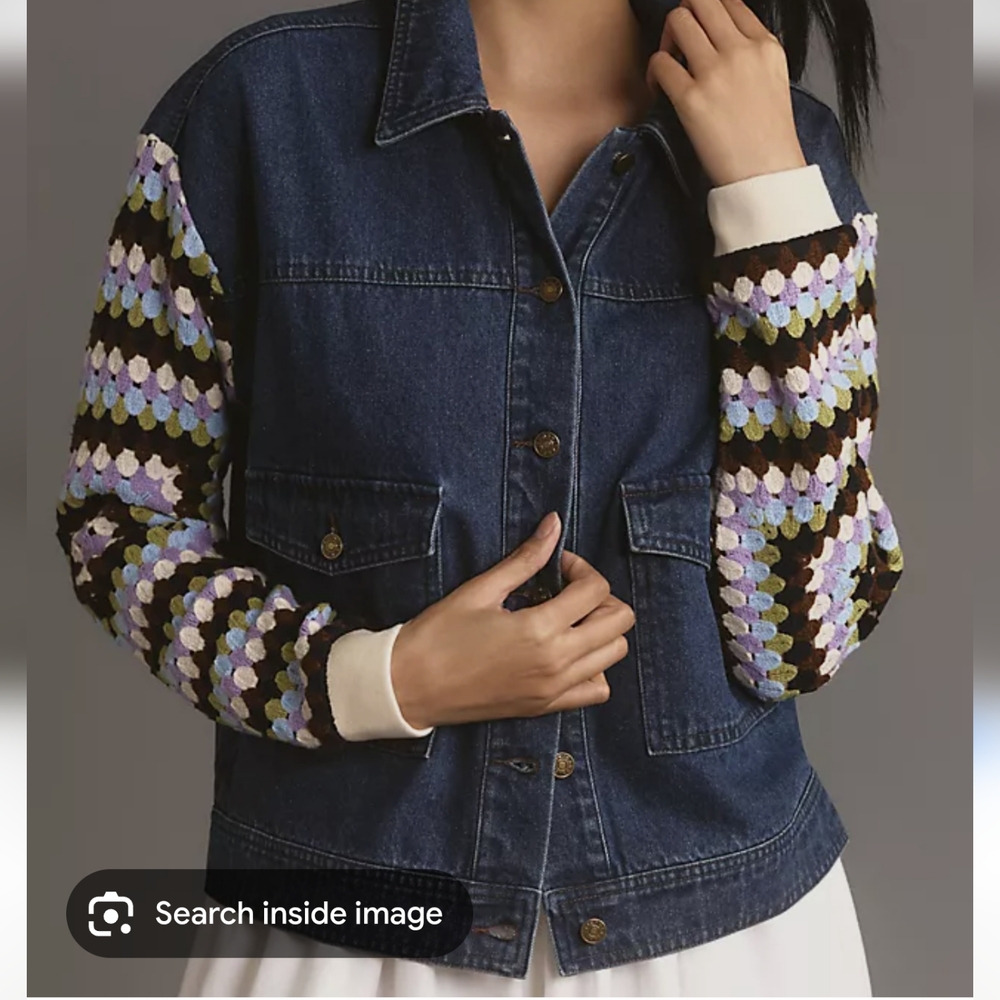 ANTHROPOLOGIE DENIM JACKET WITH CROCHETED SLEEVES.